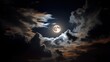 © rich - A full moon shines brightly through dramatic, layered clouds during a nocturnal sky