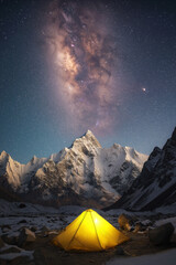 Wall Mural - Yellow tourist tent in mountains in nature under the starry sky with stars and the Milky Way at night. Landscape with colorful night sky in winter