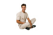 © Asier - Young caucasian man sitting on the floor isolated on white background
