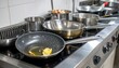 © yoga - Dirty cooking pans and stove in restaurant.