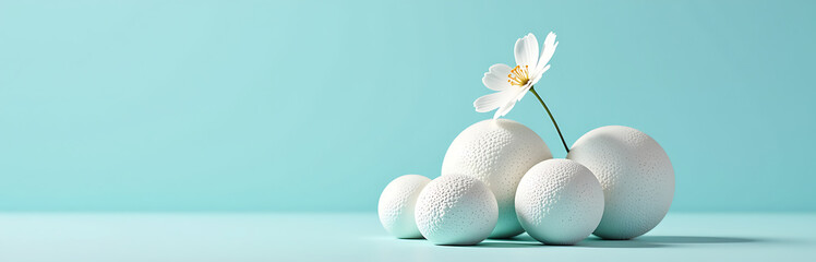 Wall Mural - delicate white flower sits atop textured geometric object cluster bright light blue background shallow focus subtle