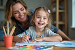 © Thanawadee - Mother and daughter painting and having fun at home
