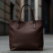 © Mshahid - brown leather bag