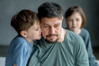 © TrueShot | Westend61 - Son embracing father at home
