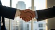 © Salman - Business handshake agreement partnership success