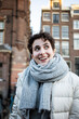 © TrueShot | Westend61 - The Netherlands, Amsterdam, Girl with short hair in the city