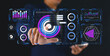 © waragron - A person interacting with futuristic digital data visualizations showing charts, graphs, and metrics in a high-tech interface.