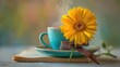 © Kafka - Teal cup of coffee or tea with a yellow gerbera, gentle light, warm tones