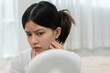 © Shisu_ka - Young woman are worried about faces Dermatology and allergic to steroids in cosmetics. sensitive skin, red face from sunburn, acne, allergic to chemicals, rash on face. skin problems and beauty