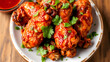 © Michael - Delicious crispy Chipotle chicken wings garnished with fresh cilantro, great for appetizers or main meals.
