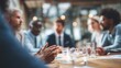 © Dani - Business meeting with diverse professionals around conference table.  Group of executives discussing plans in modern corporate setting