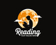 © huangguoxin - In this image, a silhouette of a child reading is depicted against a bright full moon and clouds, symbolizing imagination, exploration, and the joy of reading.