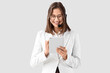 © Pixel-Shot - Female technical support agent working with tablet computer on light background