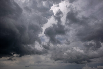 Wall Mural - dark sky with stormy clouds. dramatic sky rain,dark clouds before a thunder-storm,clouds before rain