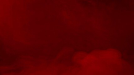 Wall Mural - thick and heavy red fog flows across the screen on a black background. a dramatic and atmospheric ov
