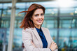 © BusinessClass by W61 - Confident businesswoman with arms crossed
