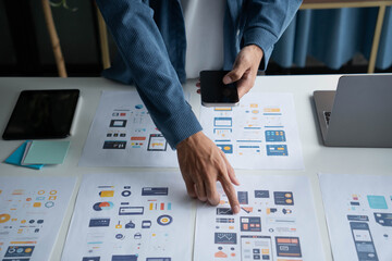 man designing ux ui and programming in tech environment