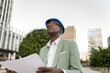 © BusinessClass by W61 - Engineer with blueprint at financial district