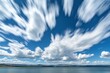 © Ifti Digital - Time lapse displaying dynamic cloud movement over tranquil saltwater lake during daytime, Time Lapse of the clouds moving above the salt water Mono Lake in California