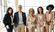 © BusinessClass by W61 - Confident multiracial business colleagues standing together at office