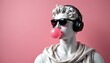 © Maryna - Classical marble statue bust with headphones, sunglasses, and pink bubblegum. Modern interpretation blends ancient art with contemporary fashion and vibrant pastel pink background.