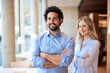© BusinessClass by W61 - Smiling colleagues with arms crossed in university