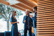 © BusinessClass by W61 - Smiling business people planning in office