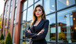 © ArtifyGraphy - Corporate professional woman standing confidently urban office setting portrait image modern environment direct view empowerment concept