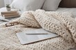 © BISO - Cozy cream knitted blanket mockup with tablet stylus