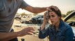 © Flash memory - Man comforting woman with head injury after horrible car accident. Road traffic crash and auto wreckage in background for insurance claim.