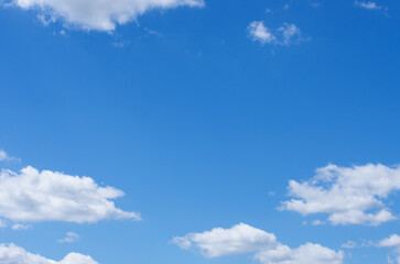Wall Mural - blue sky background with white clouds