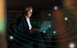 © BusinessClass by W61 - Digital composite image of senior businessman using laptop with futuristic network