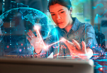 Young female scientist making diagram using AI technology in laboratory