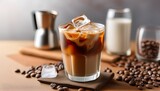 delicious iced coffee with milk swirled cold brew in a glass with ice cubes refreshing and energizing