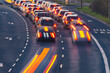 © Aleksandr Fedosov - Blurry cars in motion on a busy road during the evening rush hour