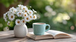 © Shivani - a white vase filled with a bouquet on the table and book and tea cup placed