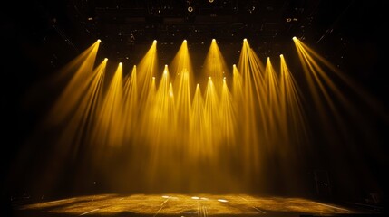 Wall Mural - golden stage lights illuminating an empty stage, creating a dramatic and atmospheric scene.