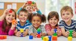 © Sai - Diverse group of happy children playing together with colorful building blocks