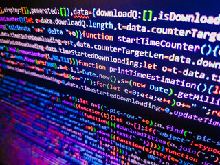 writing programming code. shallow depth of field effect. script on computer with source code. seo co
