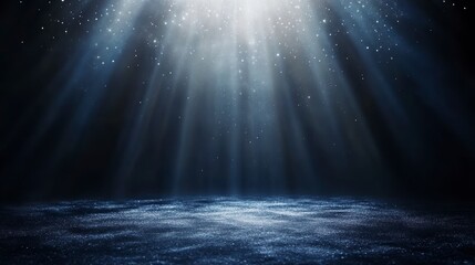 Wall Mural - dark blue background with bright light rays and sparkles.