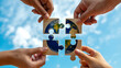 © MdMEJANOOR - Four hands unite globe puzzle pieces, symbolizing collaborative global environmental harmony