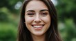 © Sabrina - A radiant smile: This close-up portrait captures a woman's radiant, genuine smile, reflecting pure happiness and confidence, set against a soft, blurred natural background.