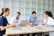 © SOMKID - Medical team brainstorming having a meeting in conference room at hospital, Medical technology and health care concept.