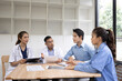 © SOMKID - Medical team having a meeting in conference room at hospital, Medical technology and health care concept.