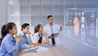 © SOMKID - Medical team with human anatomy on technological digital holographic innovative having a meeting room, Medical technology and health care concept.