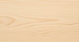 A lightcolored wood surface with a subtle, flowing grain pattern, offering a clean and natural texture