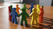© Cliff - Wooden people figures of different colors holding hands, inclusive business thinking, values of dignity and respect for all people, teamwork