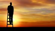 © Mary_muis.UA - Silhouette of a man standing on a ladder against a vibrant sunset sky, symbolizing ambition, dreams, and the pursuit of goals in a serene landscape