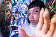 © ADDICTIVE STOCK - Futuristic latin woman exploring the vibrant metaverse