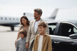 © Olena - Happy family arriving by private jet, showcasing success, lifestyle. Perfect for travel, finance, or luxury themes. Represents aspirations, dreams and family values.